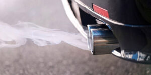 White Smoke From Exhaust Smells Like Gas: 8 Causes & Solution